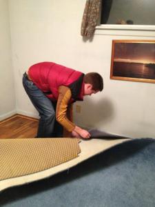 Matt revealing the beautiful hardwood floors